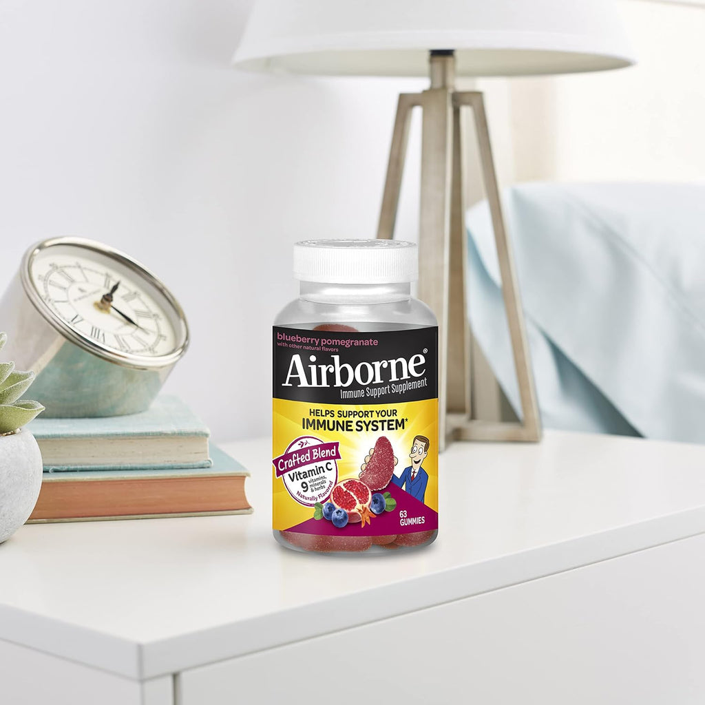 Airborne Gummies de Vitamina C 750 mg para Adultos, Suplemento de Apoyo Inmunológico con Potentes Antioxidantes Vitaminas A, C y E - 63 Gominolas, Sabor Arándano y Granada