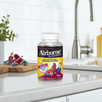Airborne Gummies de Vitamina C 750 mg para Adultos, Suplemento de Apoyo Inmunológico con Potentes Antioxidantes Vitaminas A, C y E - 63 Gominolas, Sabor Arándano y Granada